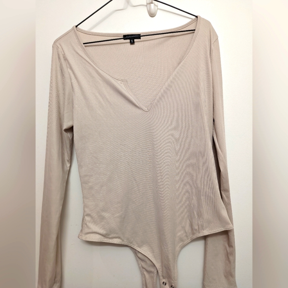 Dynamite Plunge Neck Cream Bodysuit